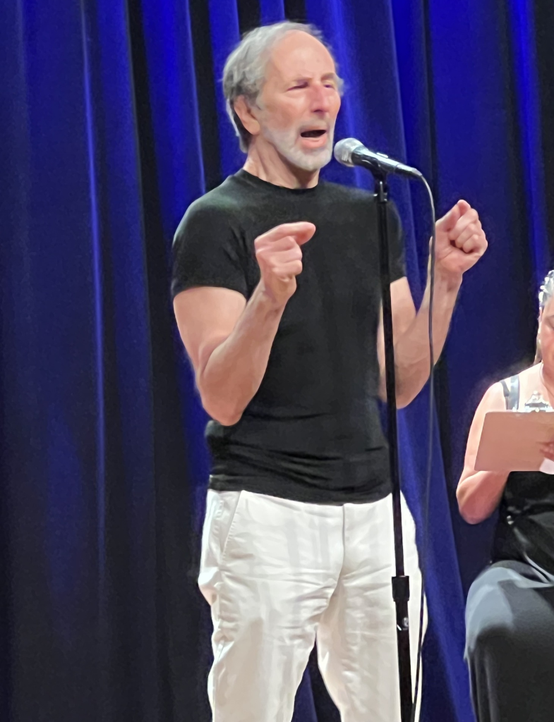 Blake Levinson performing at The Moth